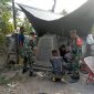 Bukti Capaian Program TMMD ke 121, Kodim 1615 Lotim Membangun Tugu Prasasti. (Foto: Harian Lombok).