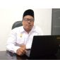 Wakil Ketua IV BAZNAS Kabupaten Lombok Timur, Asbullah Muslim, M. Pd. I.